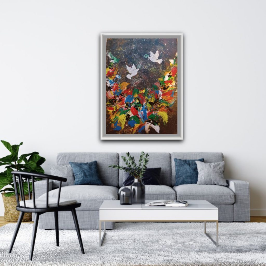 Abstract painting with birds above couch